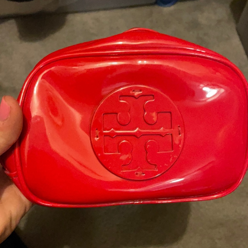 Red Tory Burch makeup or jewelry bag